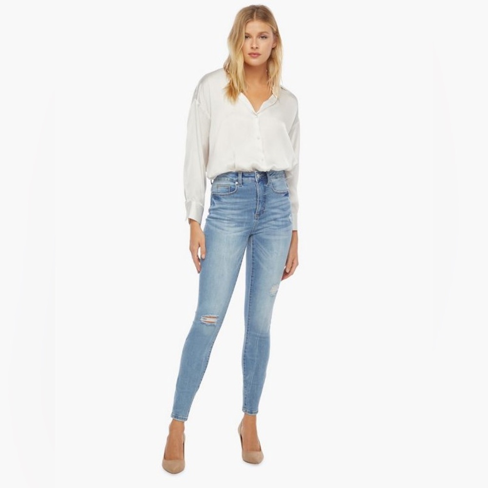 High-Waisted Distressed Jeans